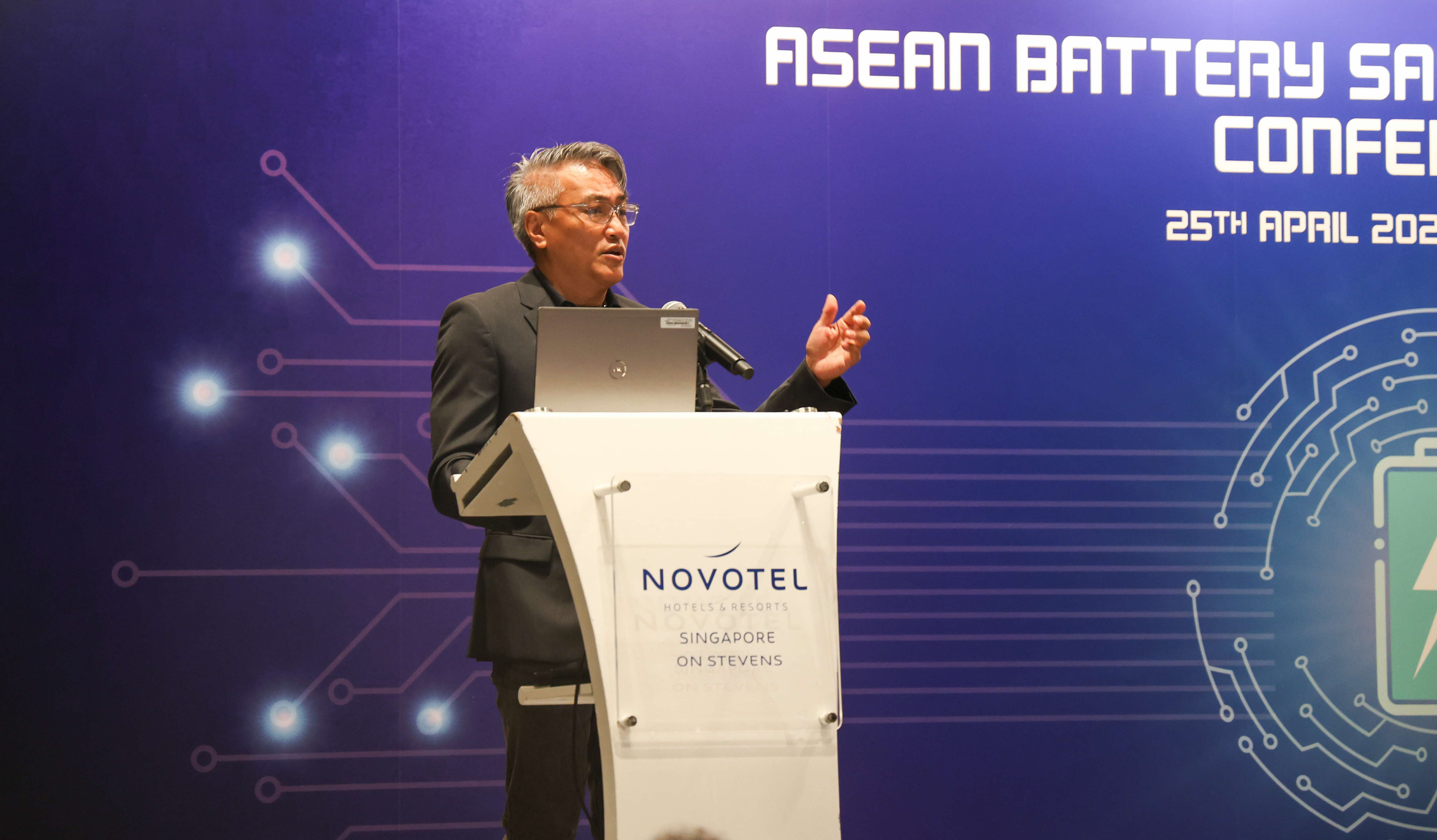 A man speaking at a podium.