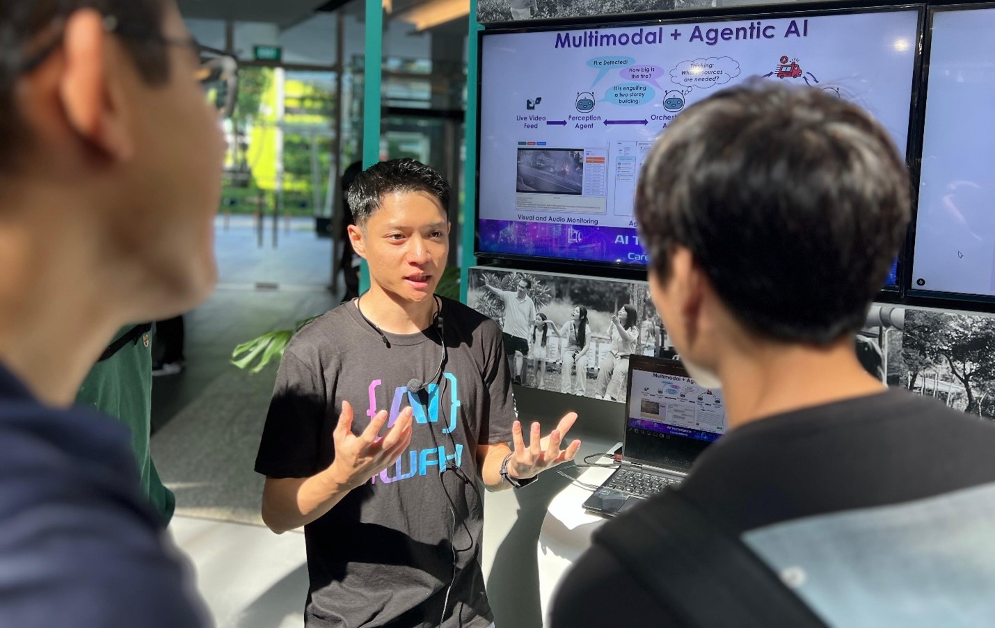 A man talking to a group of people.