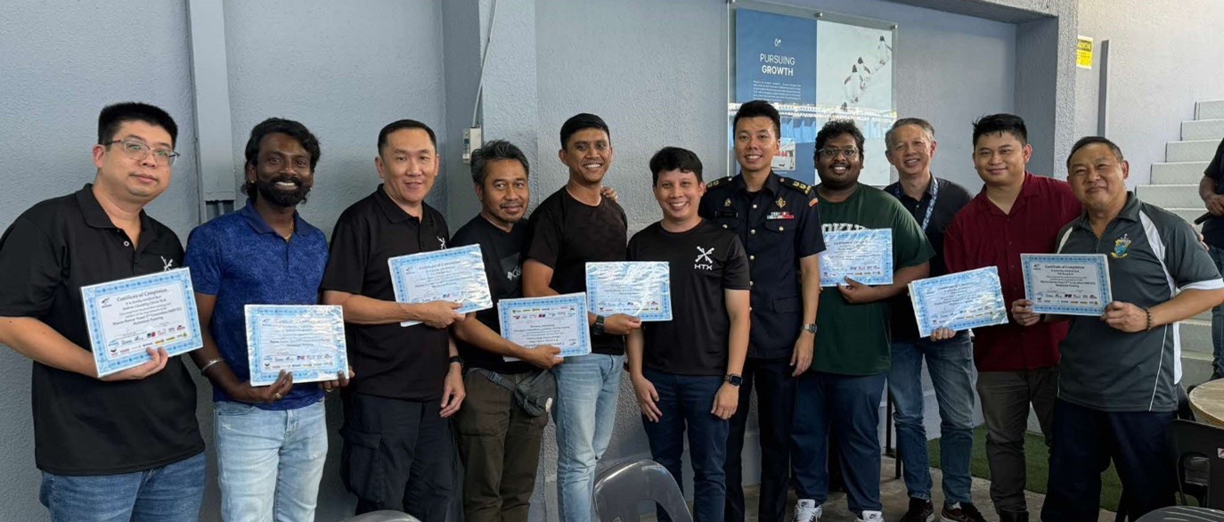 Group of standing men.