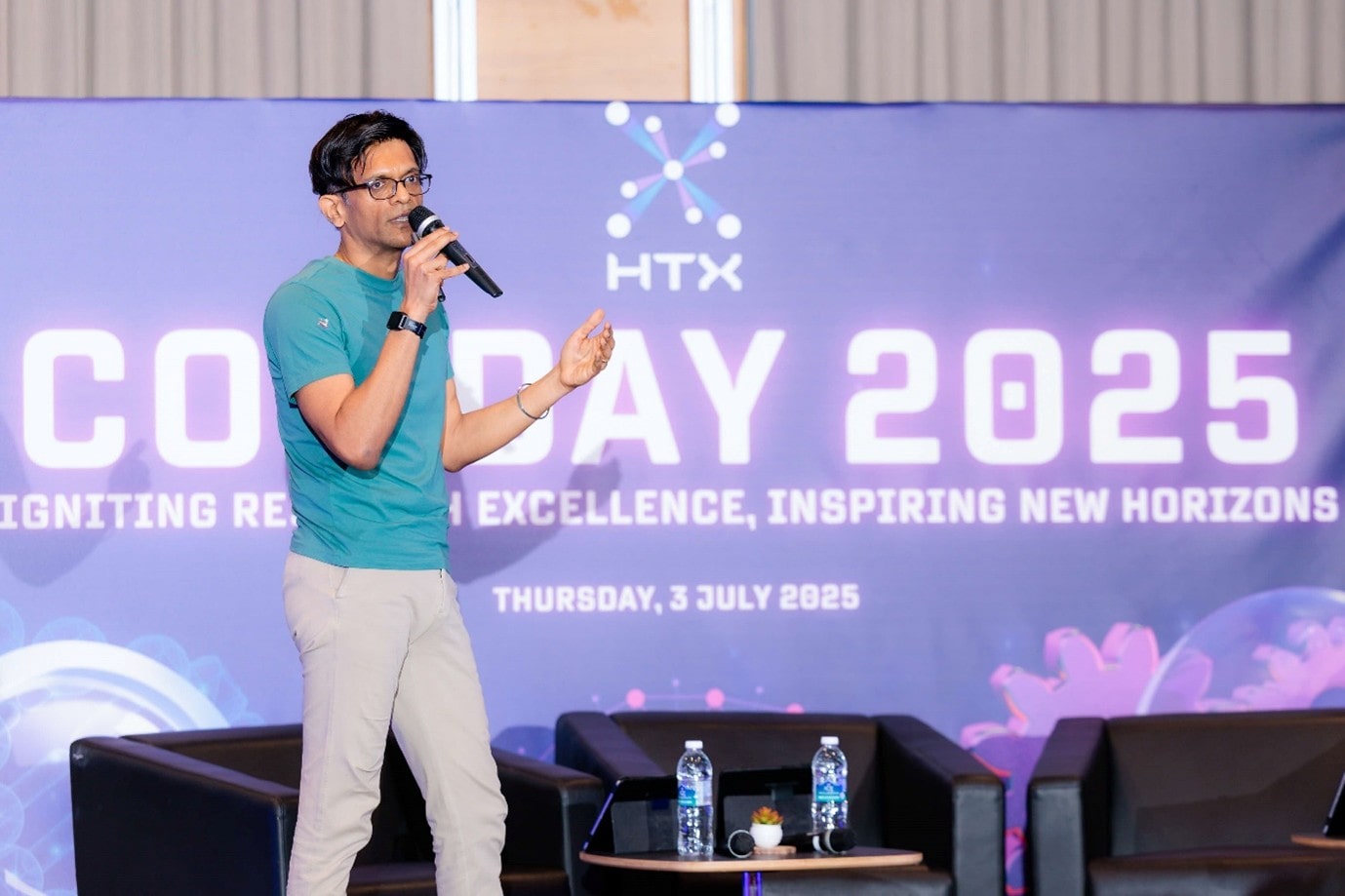 Man on stage talking