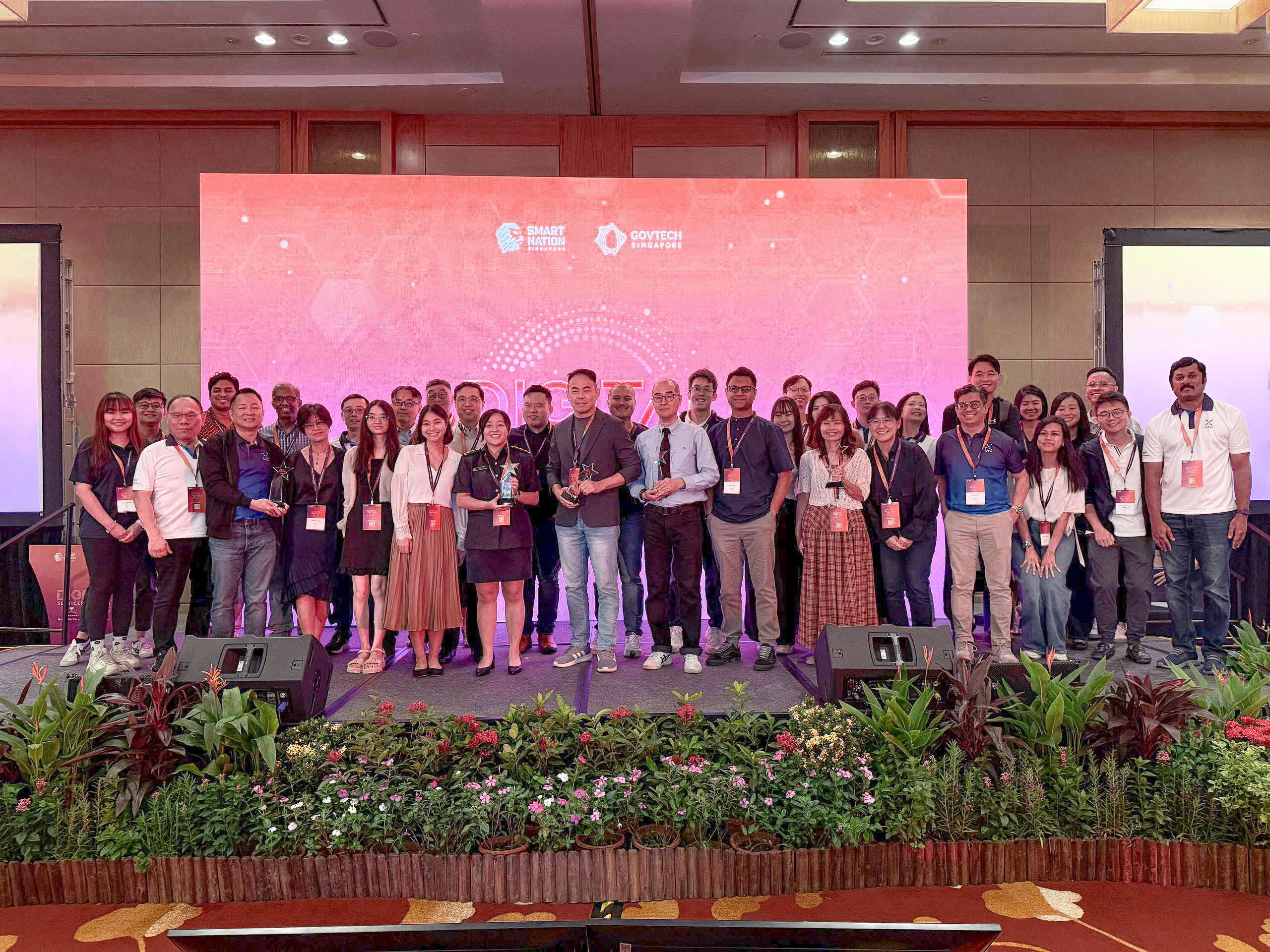 Group of people standing on stage.