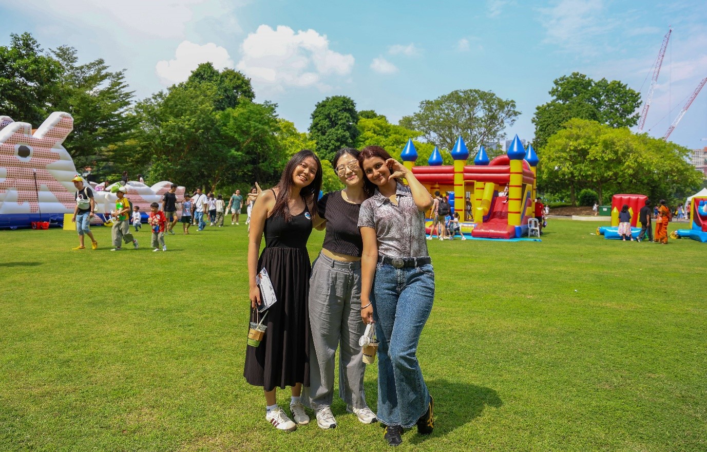 Biometrics and Profiling engineer Simran Kaur (right) and friends at HTX Family Day 2025.