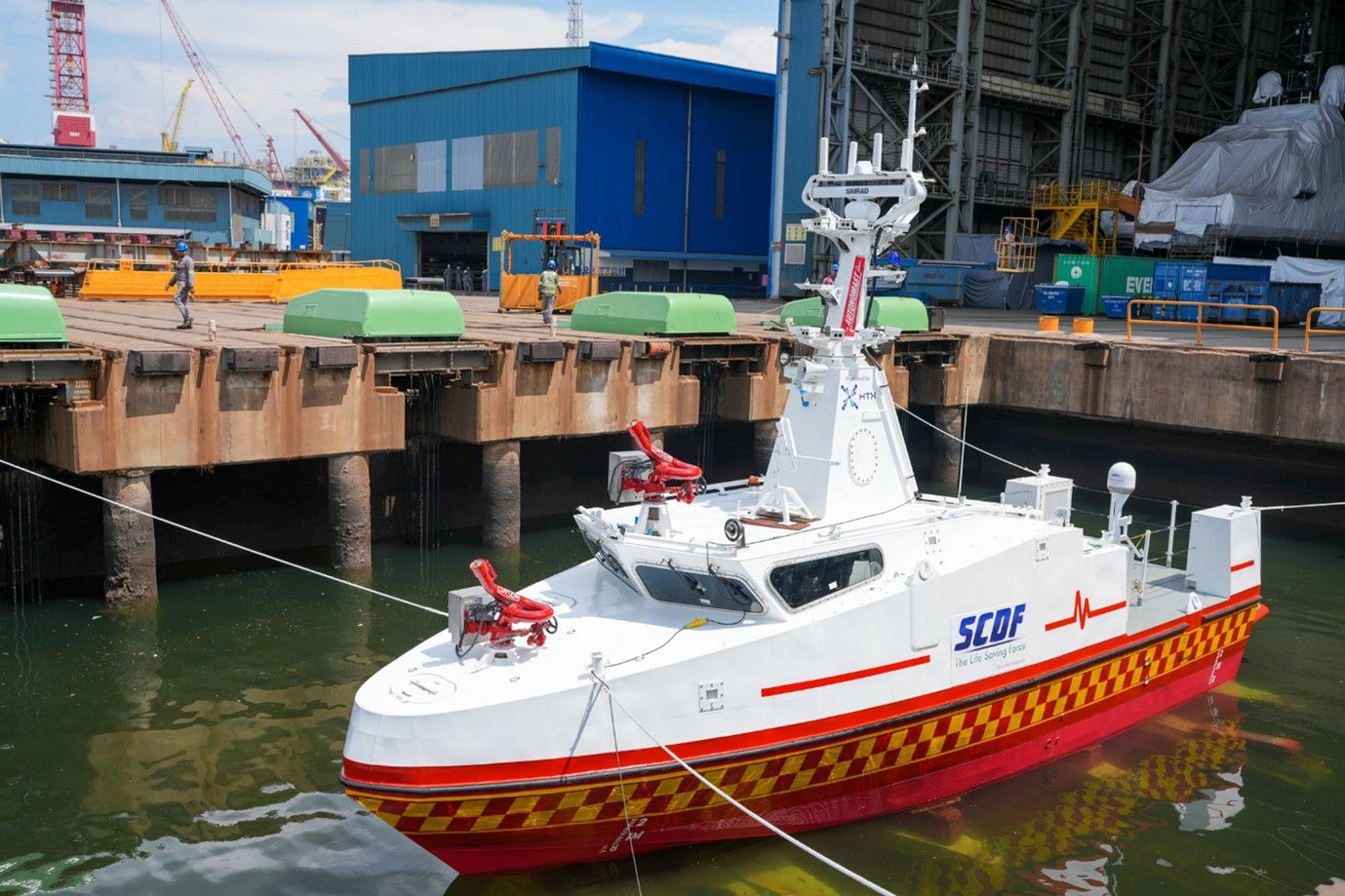 A white and red boat in the water.