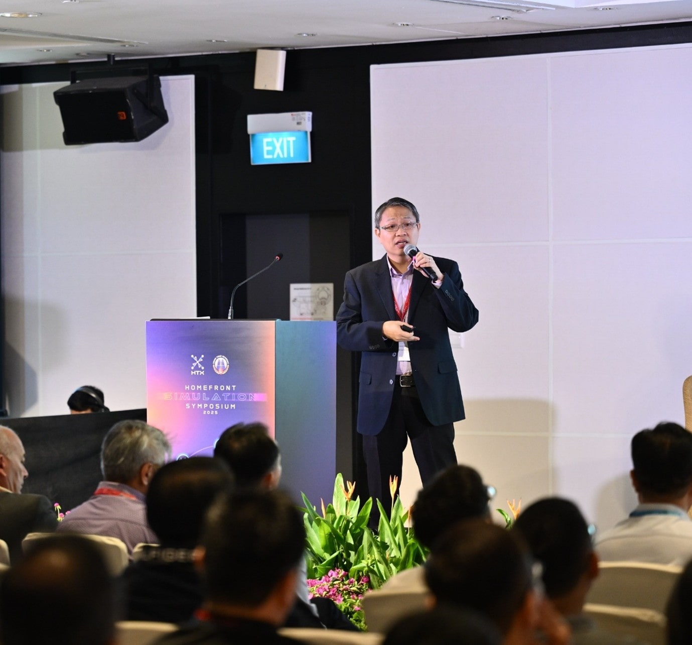 A man speaking at a podium.