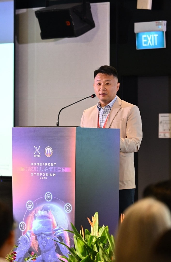 A man speaking at a podium.