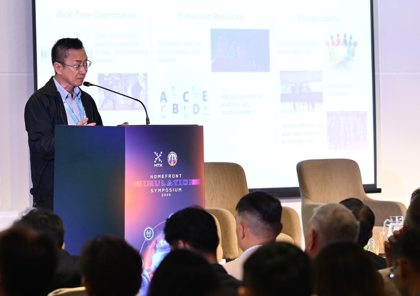 A man speaking at a podium.