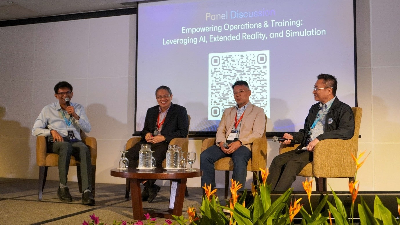 A group of people sitting on chairs.