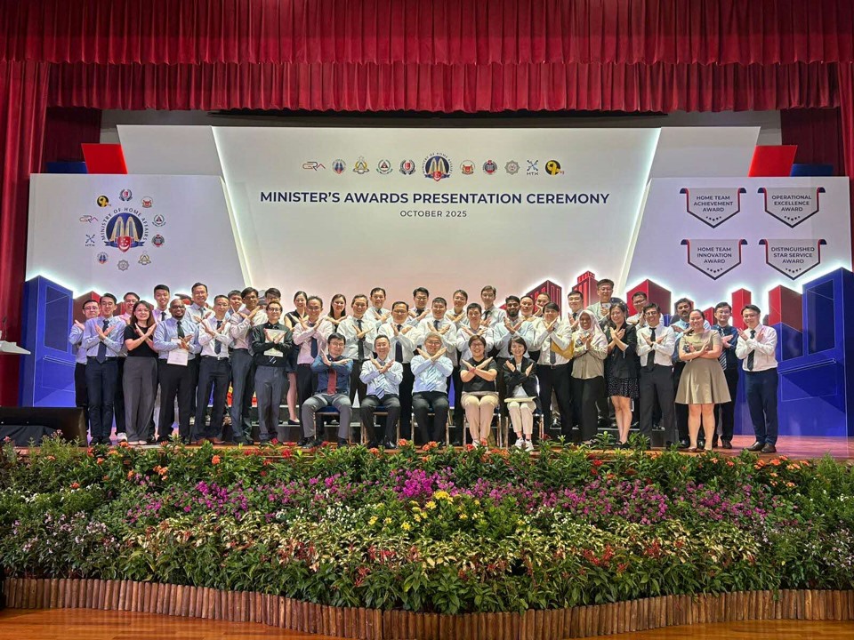 Large group on stage at the Minister's Awards Presentation Ceremony.