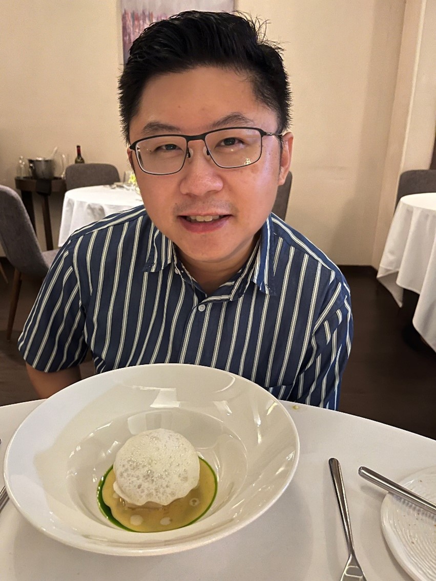 A man sitting at a table.