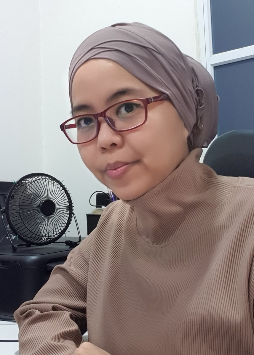 A woman posing for the camera.