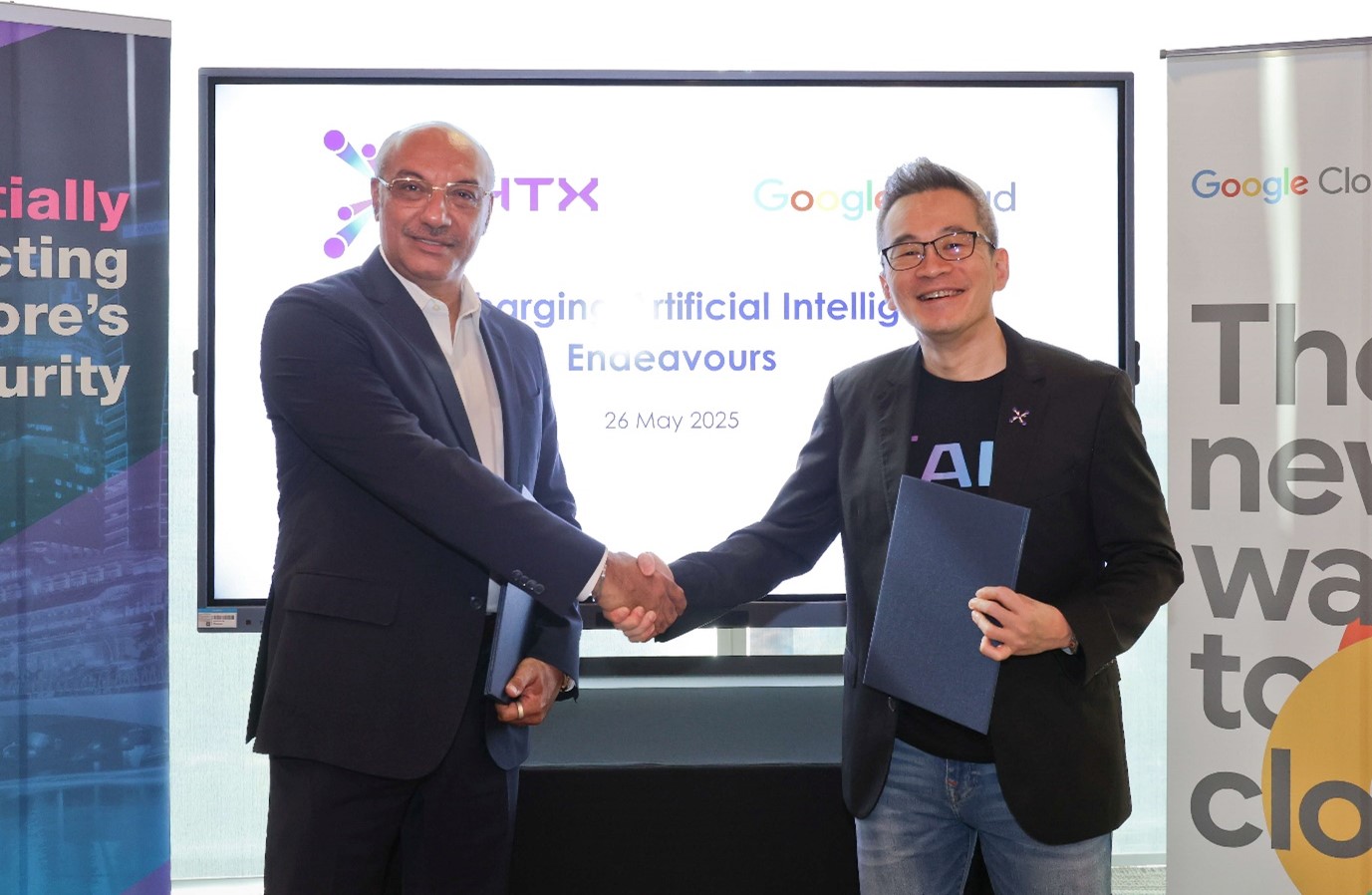 Two men in business attire.