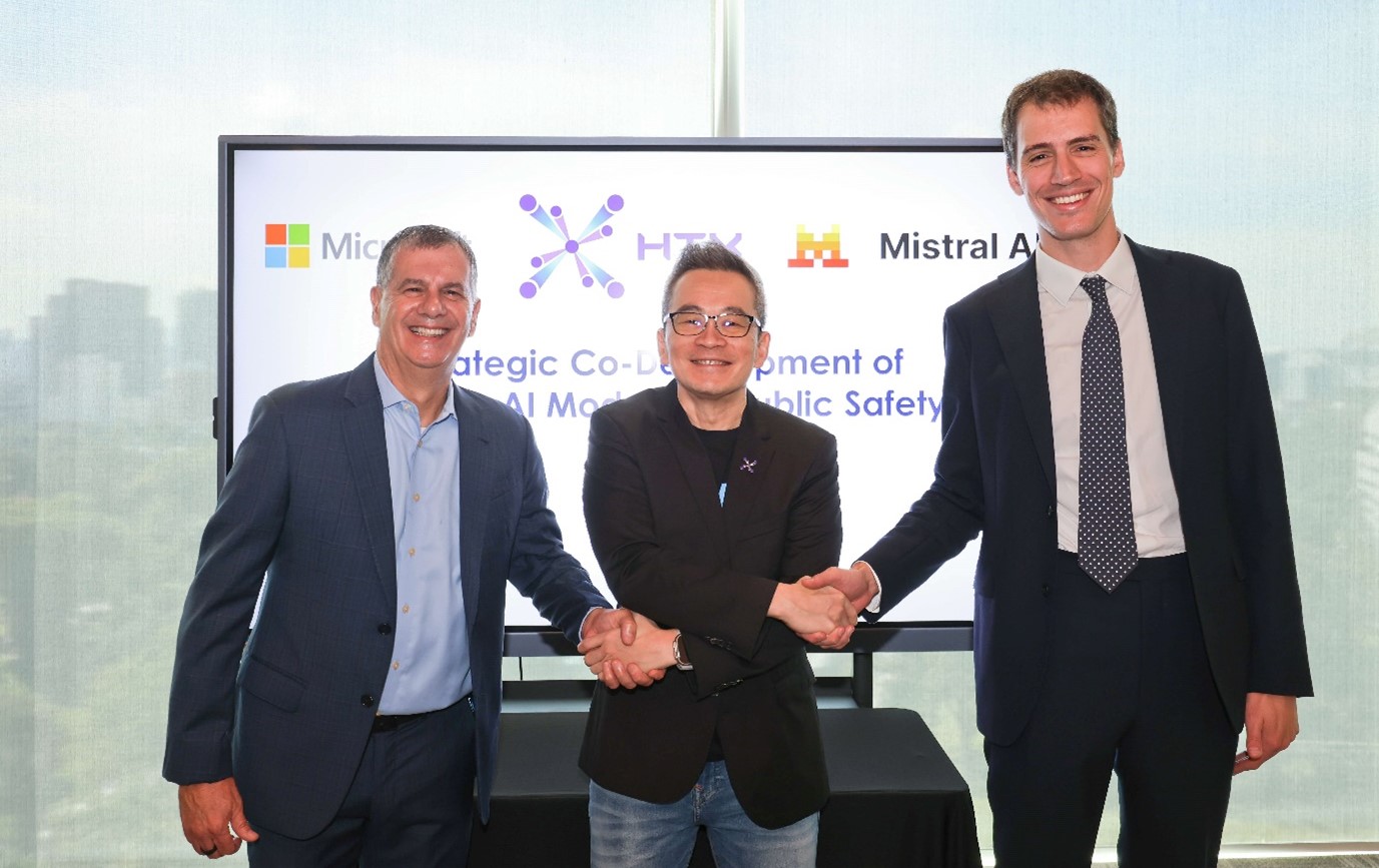 Three men in business attire.