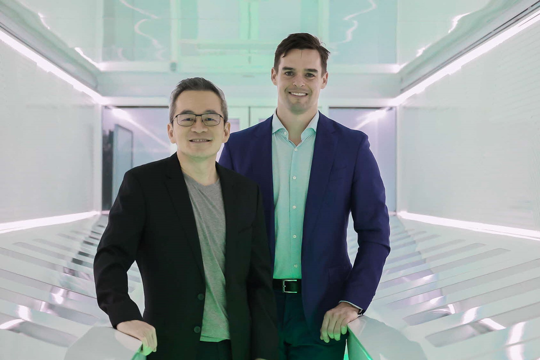 Two men in business attire.