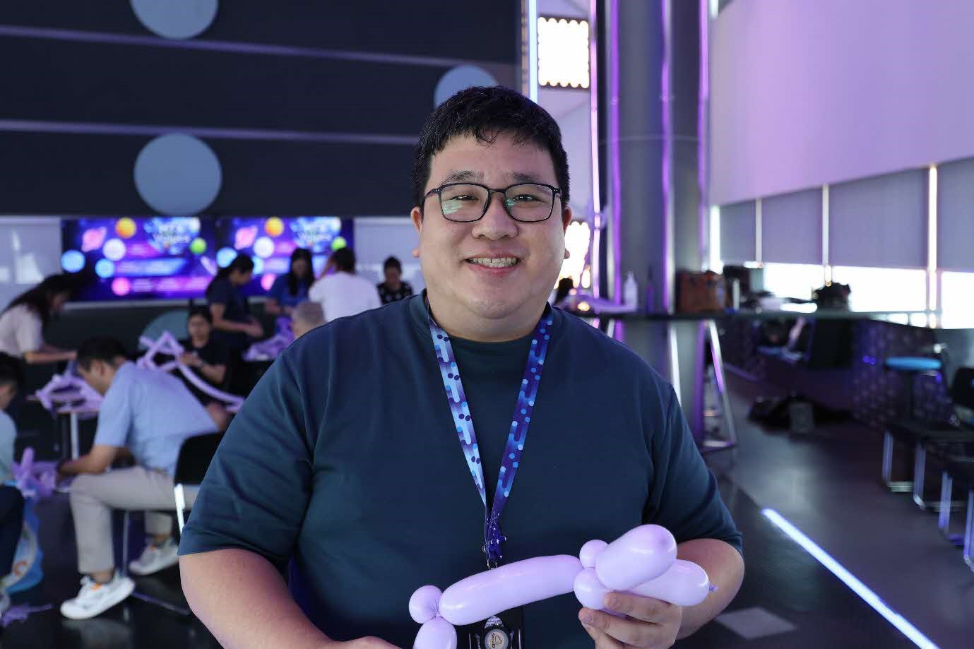 A man holding a balloon.