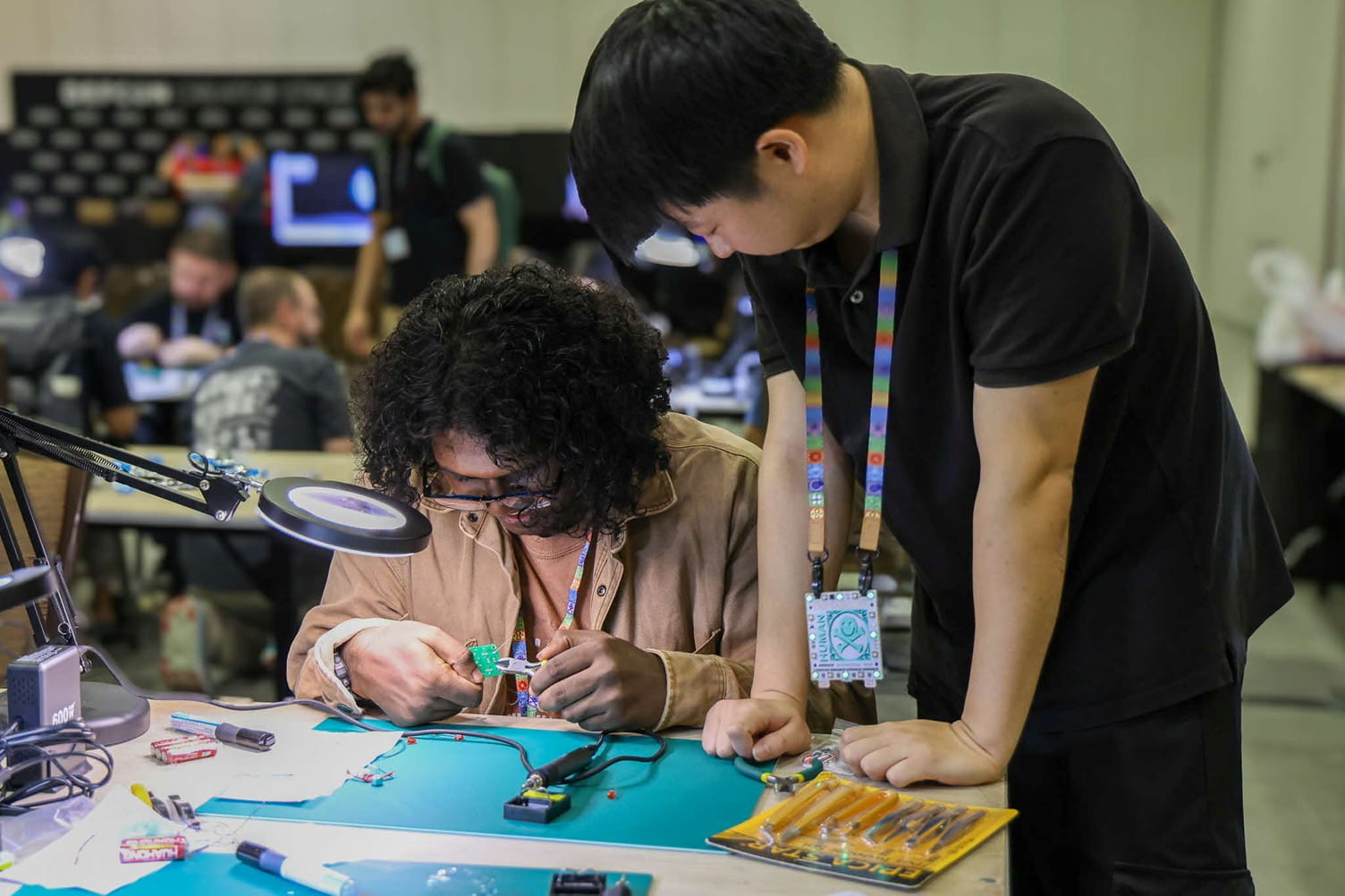 Two people working on a project.