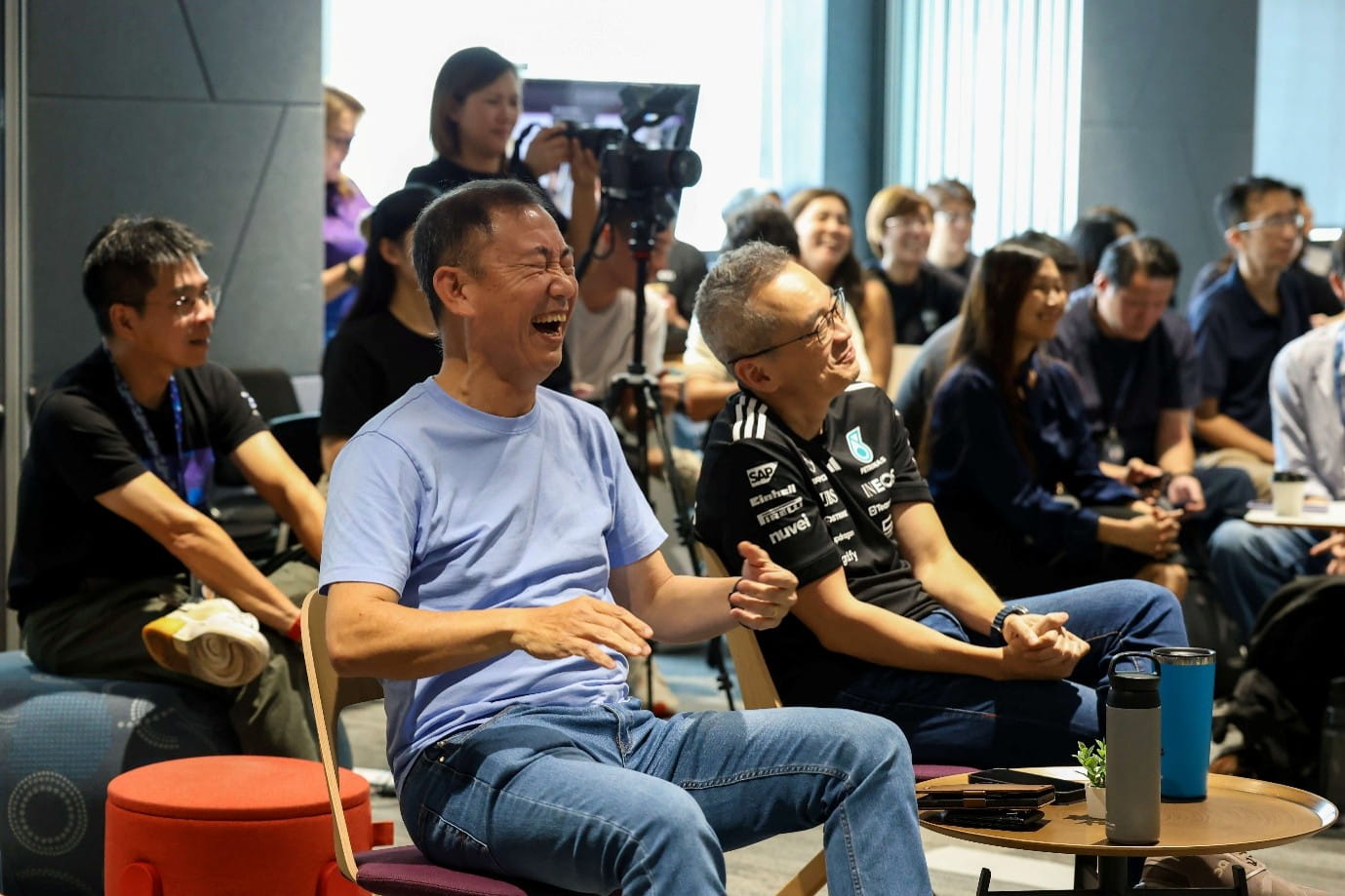 Audience enjoying a live activity.