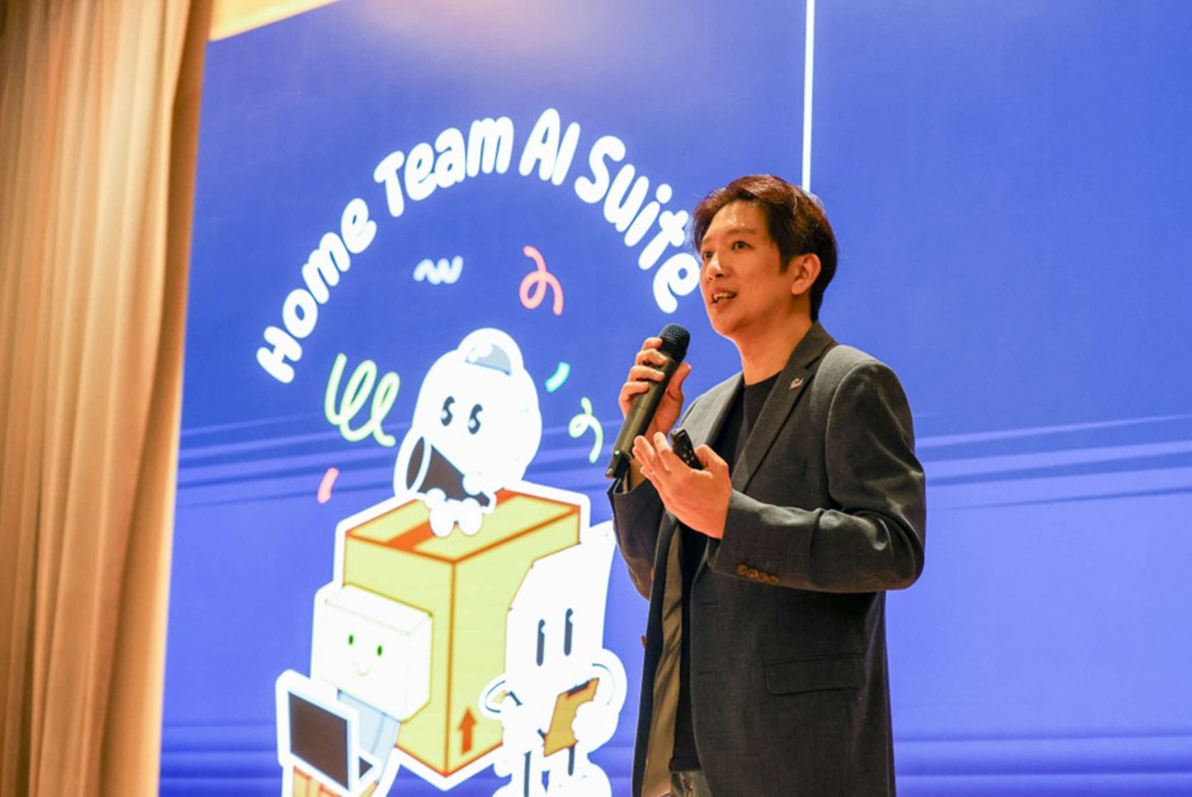 A man speaking into a microphone.