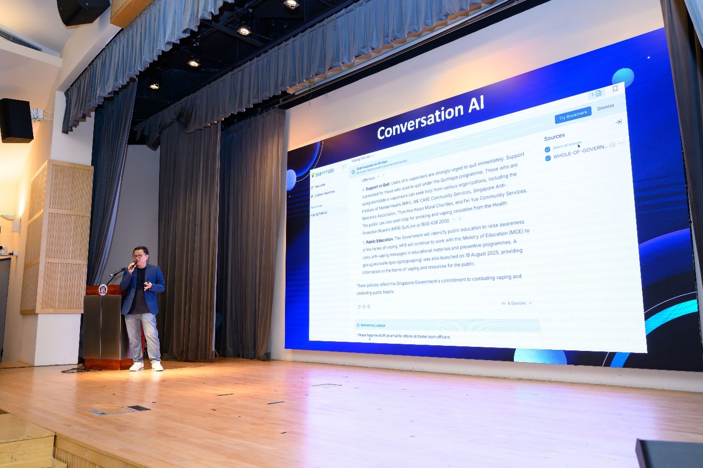A man presents his findings using a slide titled "Conversation AI”.