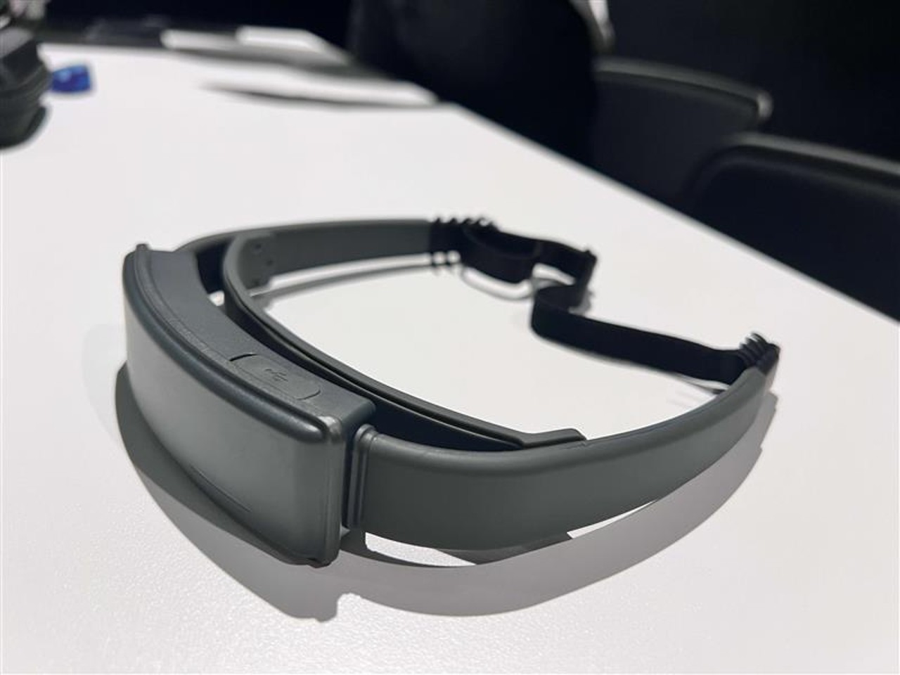 An EEG headset on a table.