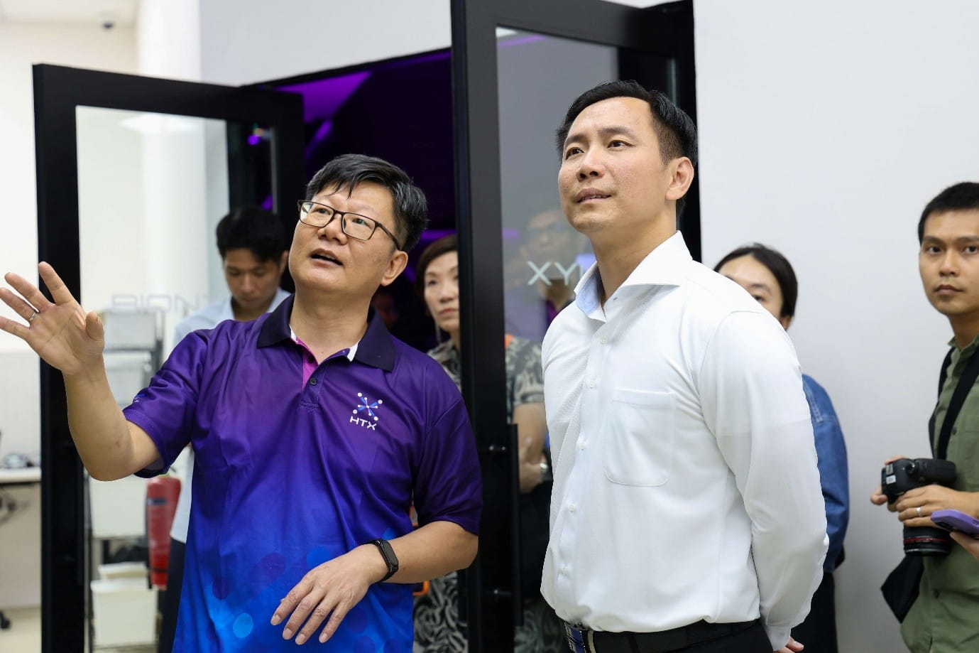 Two men in discussion.