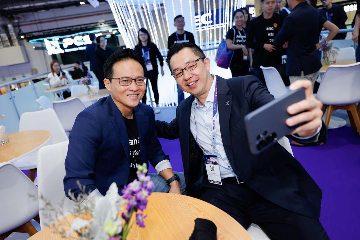 Two men taking a selfie.