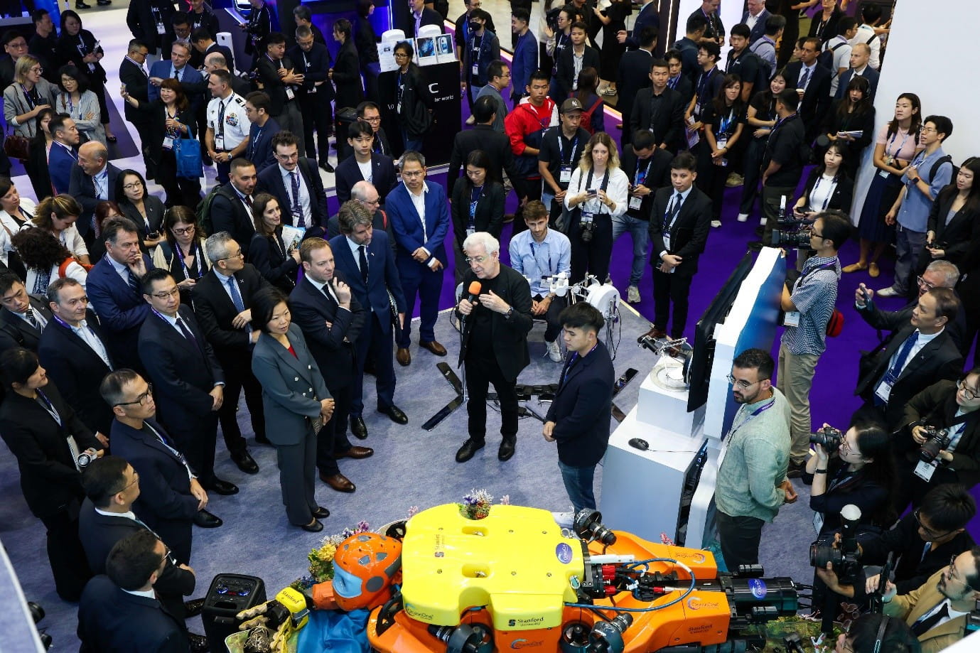 Large group of people at an exhibition.