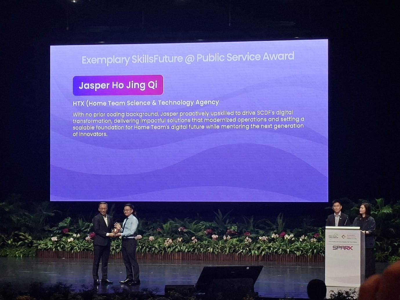 Man receiving award