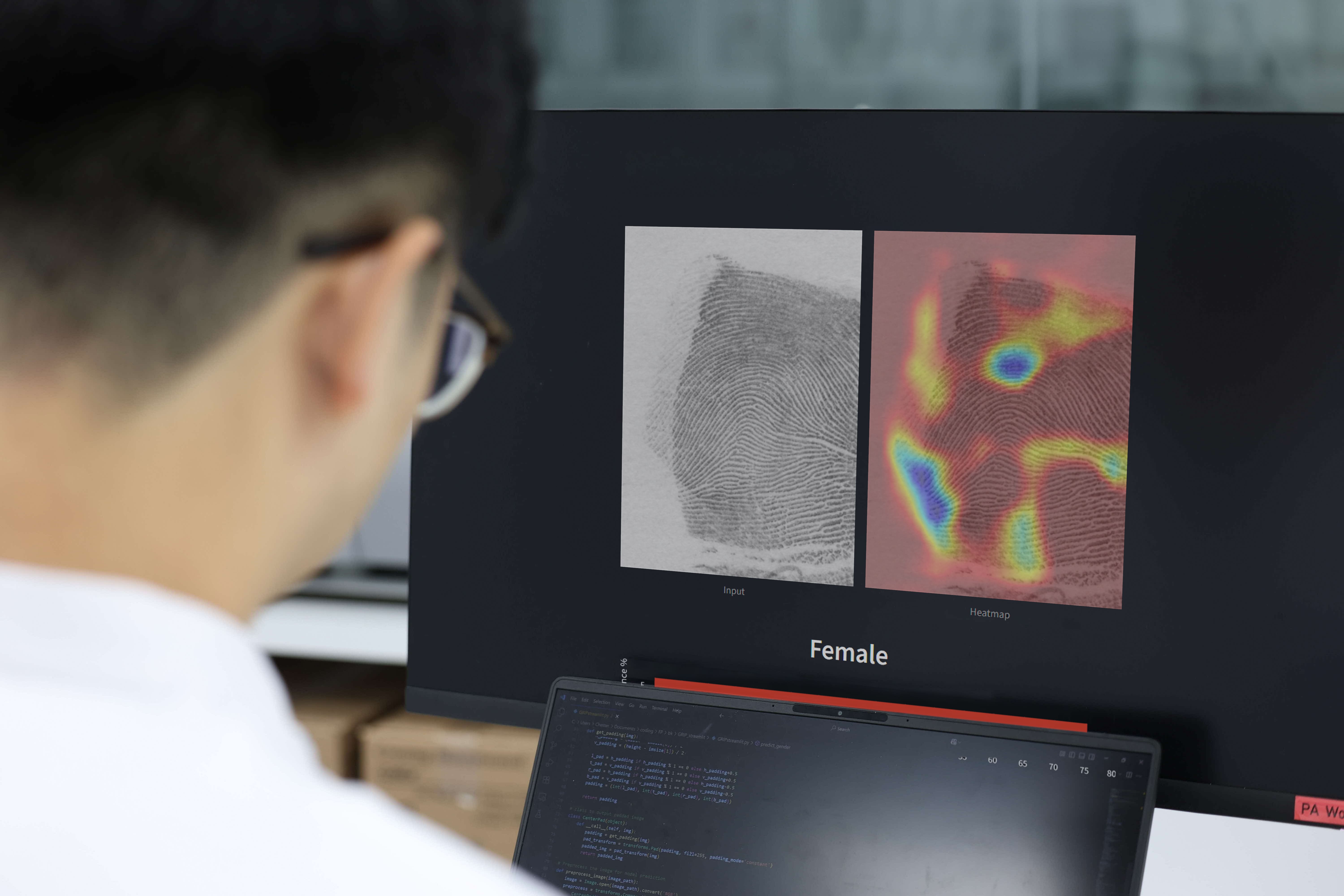 A person looking at a computer screen.