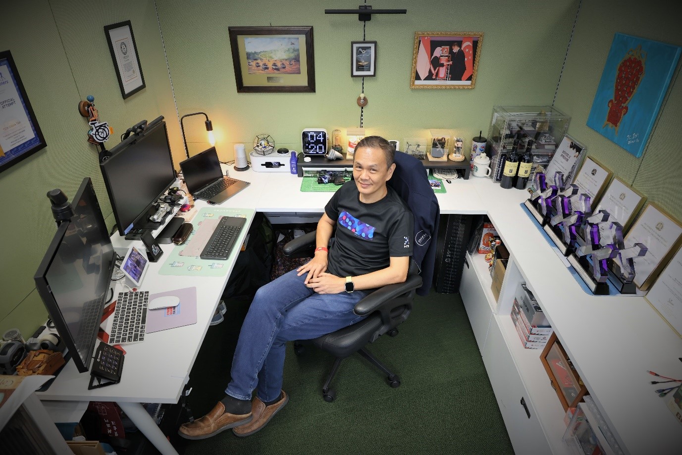 A man sitting in his office.