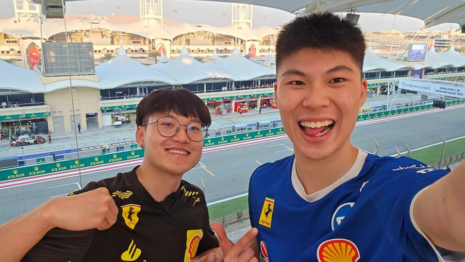 Two young men taking a selfie.